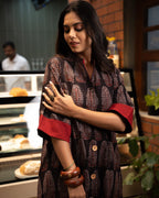 The Poshakh Midnight Tree of Life Shirt Dress.