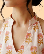 The Poshakh Coral-Bloom Fusion Halter.
